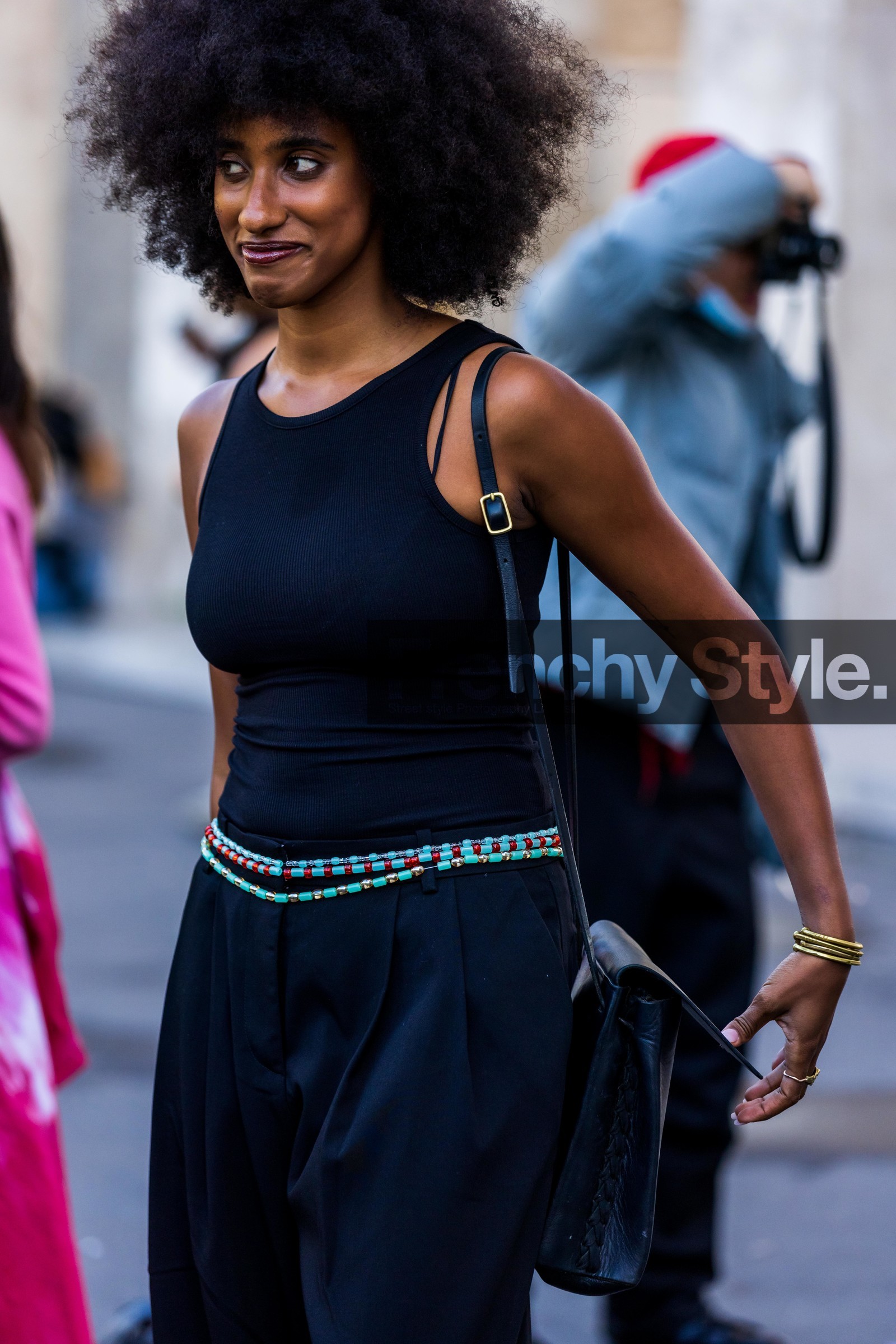 afro hairstyle, bag, bead belt, black bag, black pants, black tank top, black top, colored belt, gold bracelet, leather bag, natural makeup, pants, pleated pants, tank top, fashion week, frenchystyle, FW, jonathan paciullo, street style, PFW, PARIS, SPRING SUMMER 2022, SS 22, vertical, atmosphere details