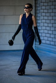 black sunglasses, sleeveless vest, blue vest, blue pants, blue suit, black gloves, highwaist pants, oversized pants, black handbag, platform sandals, black sandals, karina nigay, fashion week, frenchystyle, FW, jonathan paciullo, street style, vertical, full length