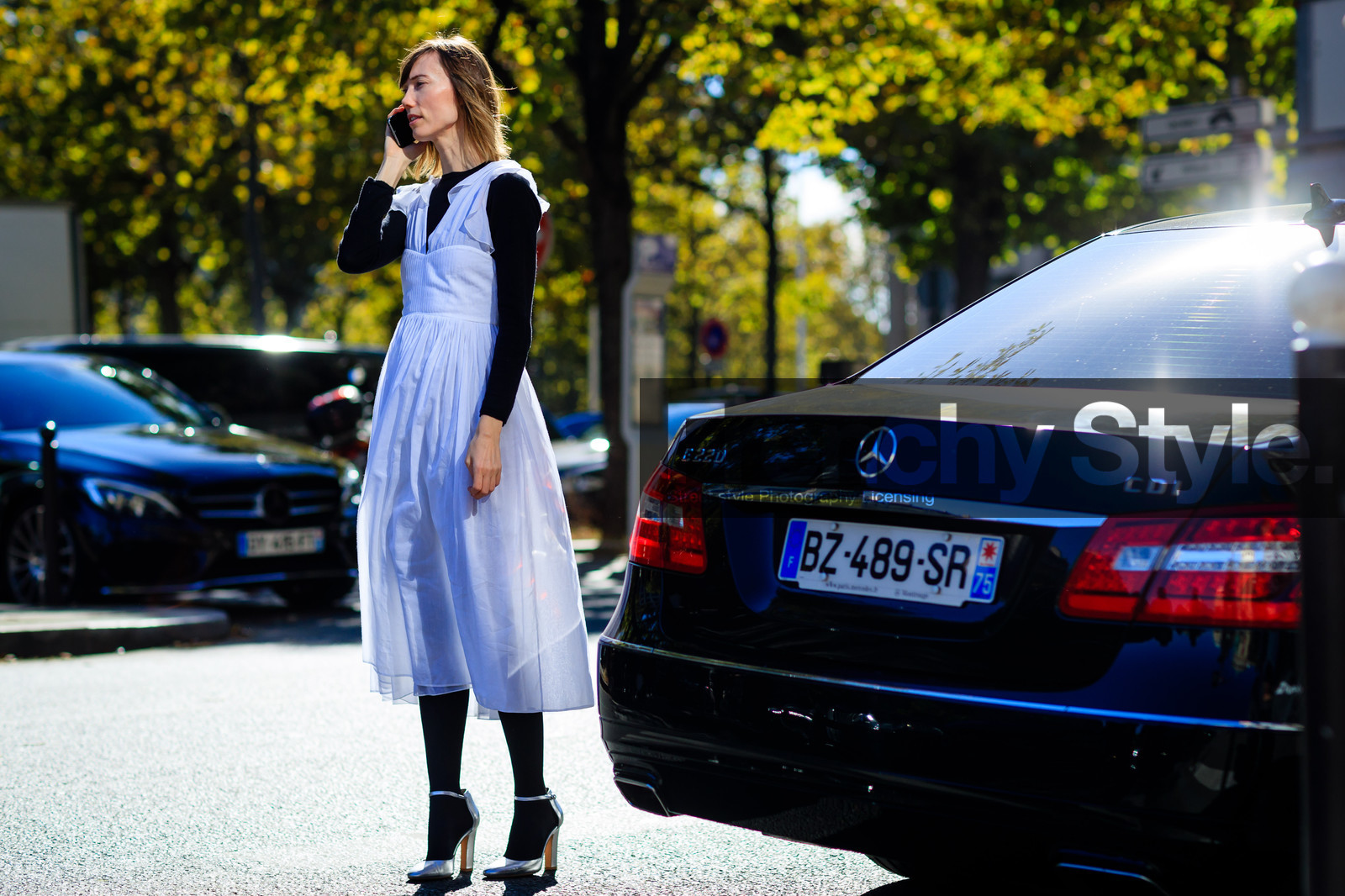 anya ziourova, atmosphere details, black and white, black sweater, fashion week, frenchystyle, full length, FW, high heels, horizontal, jonathan paciullo, leather shoes, PARIS, PFW, shiny shoes, silk dress, silver shoes, SPRING SUMMER 2017, SS 17, street style, tights, white dress